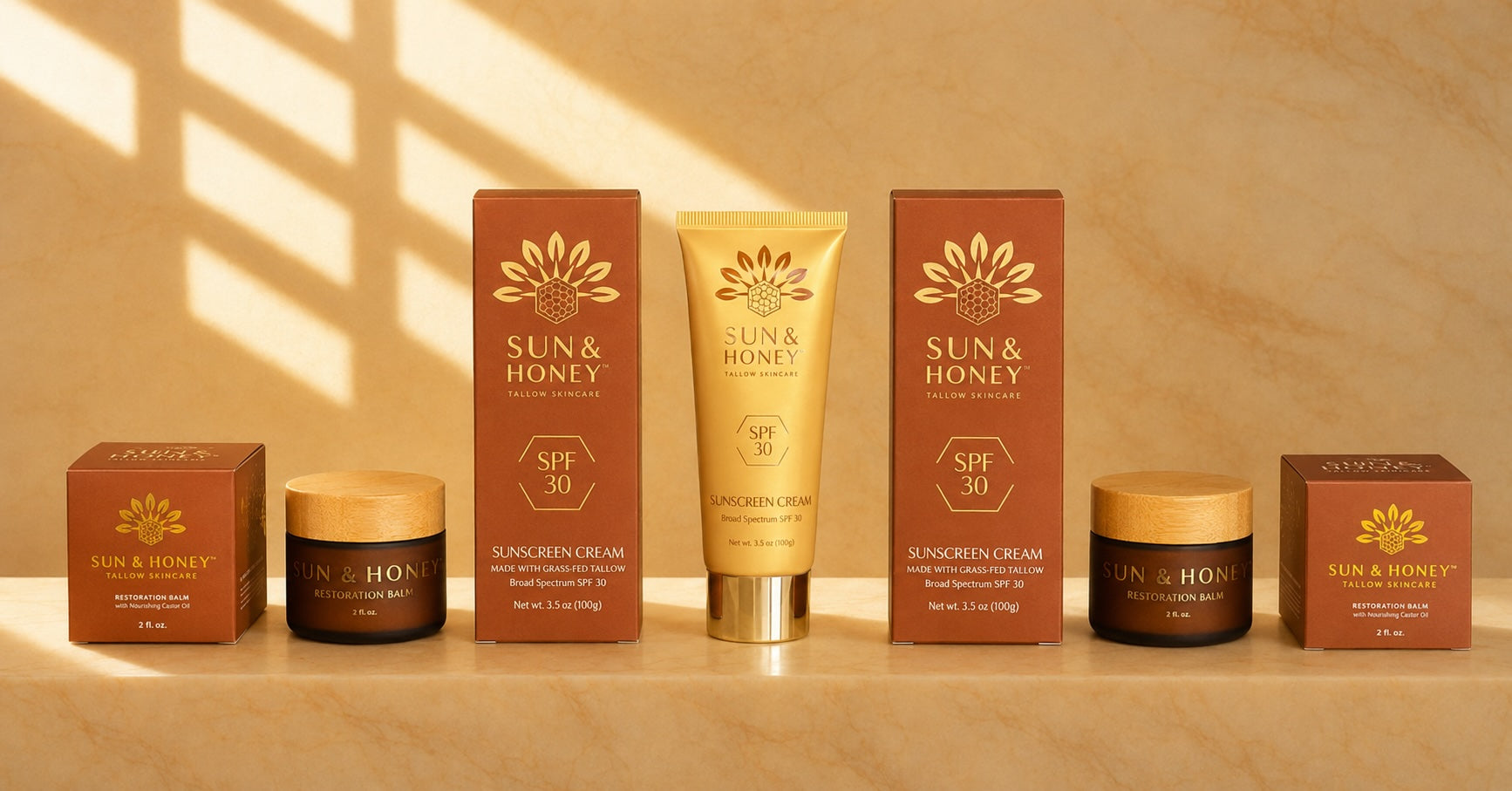 Display of Sun and Honey Tallow Restoration Balm and Sun and Honey Tallow Sunscreen Products