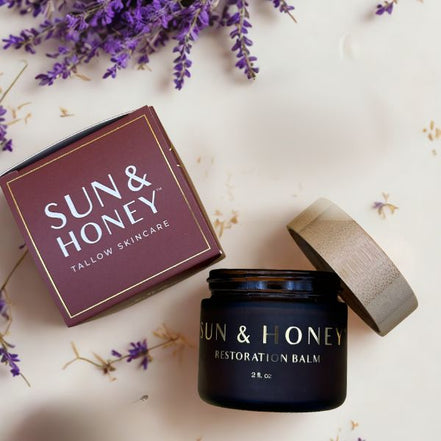 Sun and Honey tallow balm with castor oil as moisturizer in amber jar